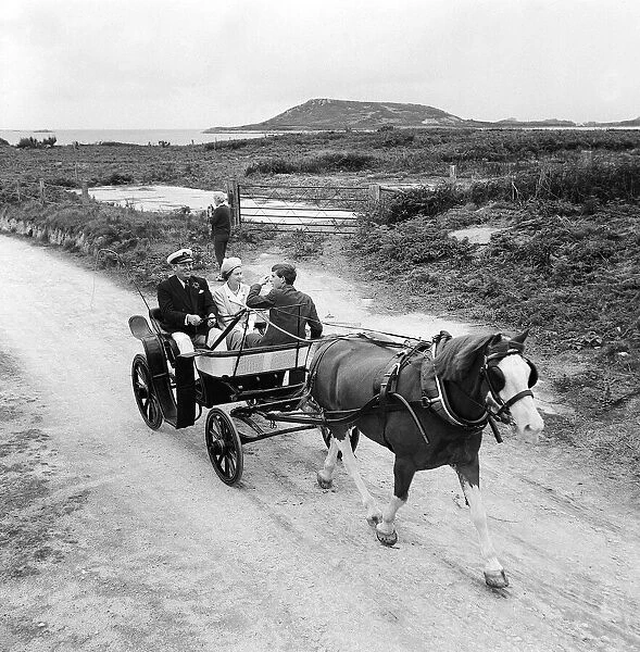 Queen Elizabeth and Prince Charles touring the Scilly Isles 1967 in a horse drawn