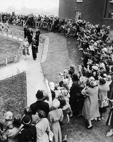 Queen Elizabeth the Queen Mother cheered by crowds gathered outside the Great Colmore