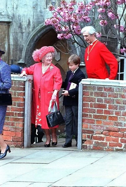 Queen Elizabeth, the Queen Mother, being helped by her great-grandson Prince William