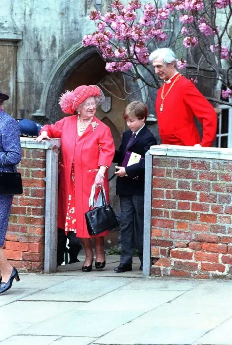 Framed Print : Queen Elizabeth, the Queen Mother, being helped by her great-grandson Prince William Framed Print : Queen Elizabeth, the Queen Mother, being helped by her great-grandson Prince William
