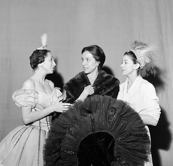 Queen Elizabeth, The Queen Mother, and Princess Margaret attend a gala charity matinee of