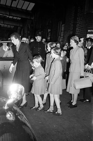 Queen Ingrid of Denmark and her three daughters arrive in London