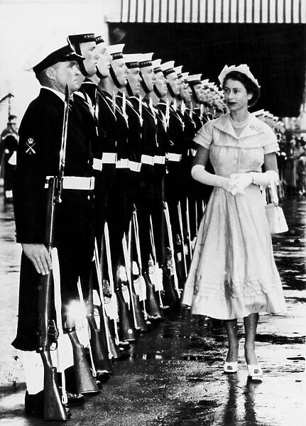 The Queen inspects a Naval guard of honour at Auckland, New Zealand