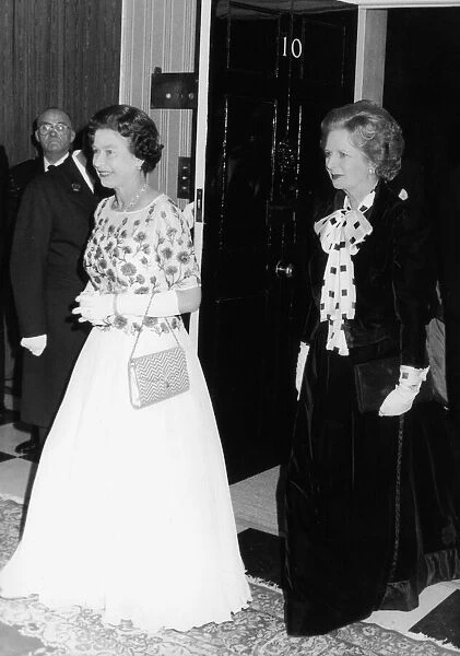 The Queen is met by Prime Minister Margaret Thatcher at number 10 Downing Street for a