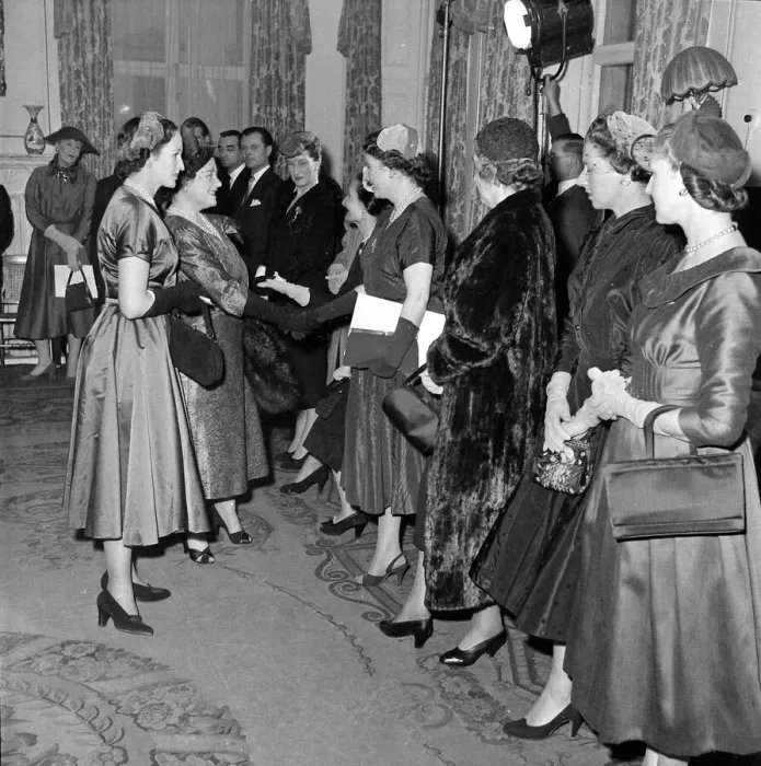 Framed Print : The Queen Mother seen here at the Salon of clothes designer Hardy Amies following a