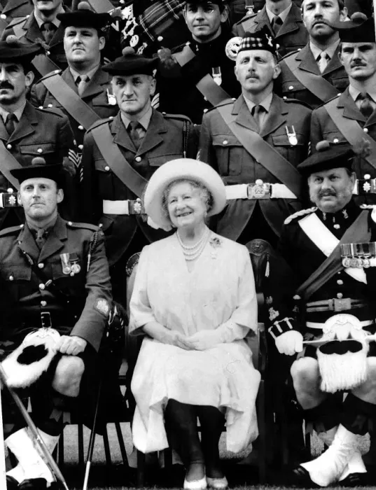 Framed Print : Queen Mother sitting with soldiers of the 1st Battalion 51st Highland Volunteers Framed Print : Queen Mother sitting with soldiers of the 1st Battalion 51st Highland Volunteers