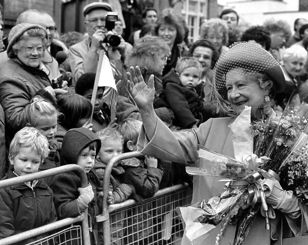 The Queen Mother, well wrapped up against the cold, earned a warm welcome from crowds as