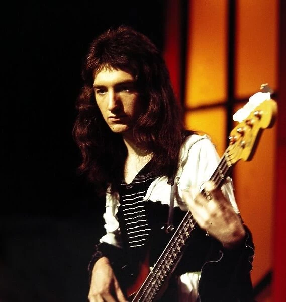 Queen - Pop Group. John Deacon seen here in rehearsals at the White City studios of Top