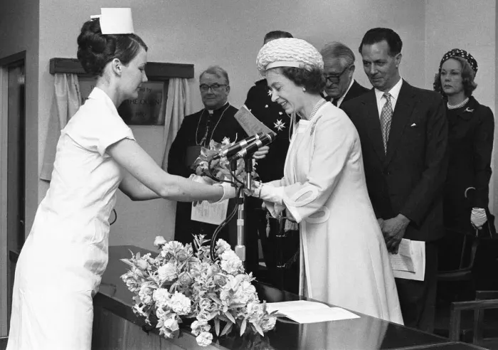 Framed Print : The Queen is presented with a bouquet of flowers during her visit to Walsgrave Hospital Framed Print : The Queen is presented with a bouquet of flowers during her visit to Walsgrave Hospital