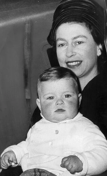 The Queen with Prince Andrew on her lap less than a year old - January 1961