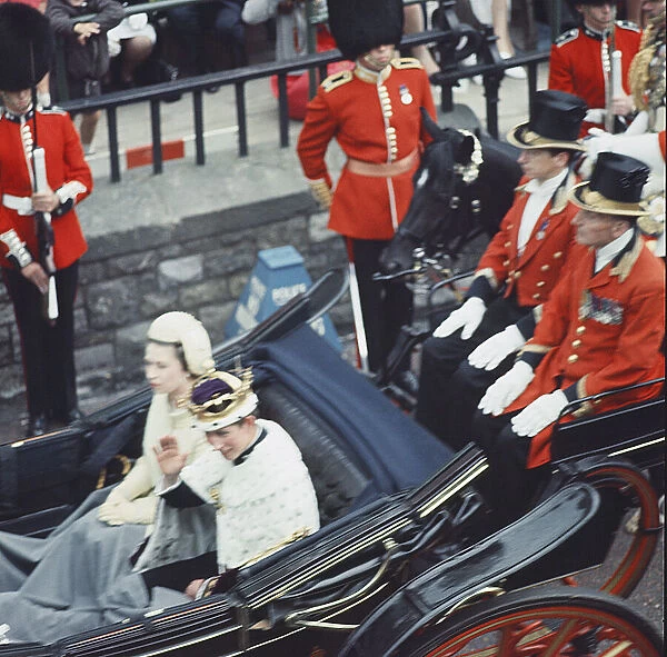 The Queen and Prince of Wales drive through Caernarfon after Investiture July 1969