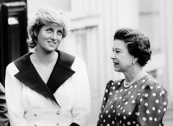 The Queen and Princess Diana talk outside outside Clarence House for the Queen Mothers