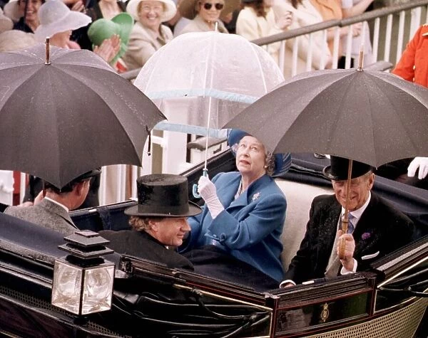 Queen protects herself from the rain as she arrives in a horse-drawn carriage at