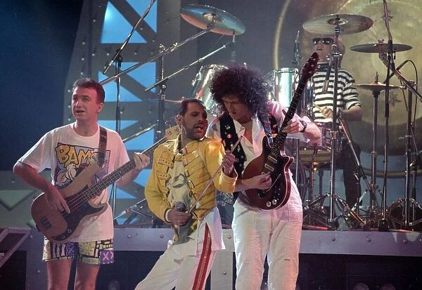 Queen Rock Group, Freddie Mercury, Brian May and John Deacon on stage. Novermber 1989