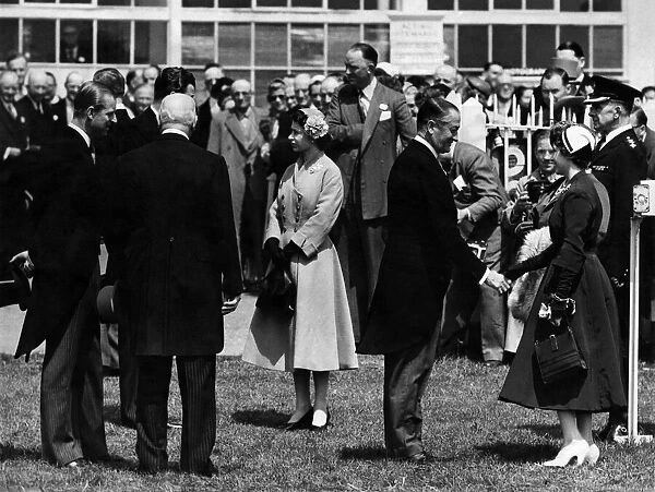 The Queen is seen chatting to the Earl of Rosebery, The Earl of Derby