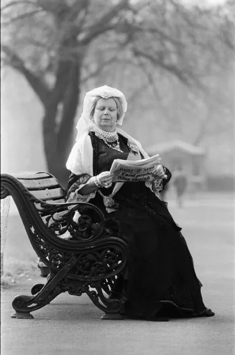 Framed Print : A Queen Victoria lookalike sitting on a park bench in Kensington Gardens close Royal