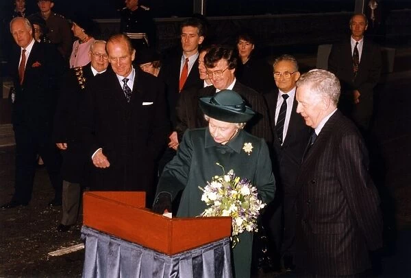 The Queen visits Manchester, 1st December 1994. Pressing button to open new bridge