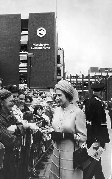 The Queen visits Manchester. The Queen completes her walk along Spinningfield to her car
