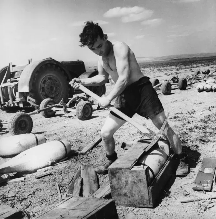 Framed Print : R. A. F armourers at work in Tunisia, preparing airfield. 5th May 1943