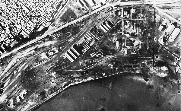 R. A. F. bombs on SFAX, Axis key port North Africa. (Picture) Bomb damage at SFAX