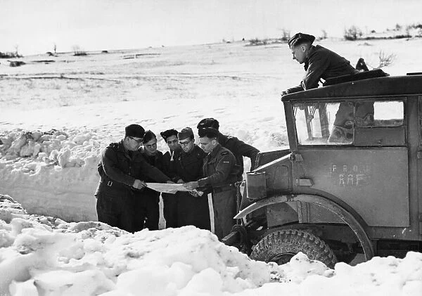 R. A. F. men helped by an Italian officer in eastern Italy. January 27th 1944
