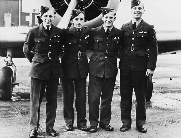 R. A. F. pilots win their wings at Medicine Hat, Alberta. Left to right: J. N. Harrison, J. J