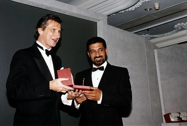Race Horse Owner Sheikh Ahmed receiving a trophy, circa 1995