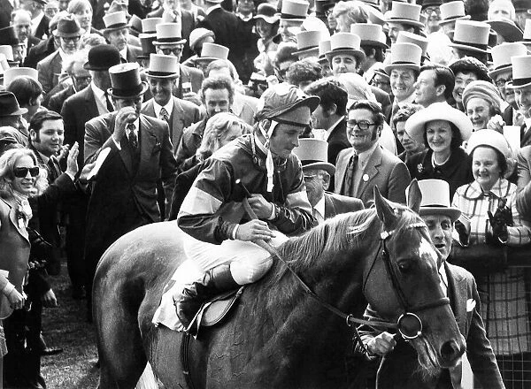 Racehorse Grundy and jockey Pat Eddery are led in after winning The Derby at Epsom