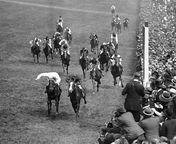 Racehorse Humorist ridden by jockey Steve Donaghue wins the Epsom Derby, June 1921