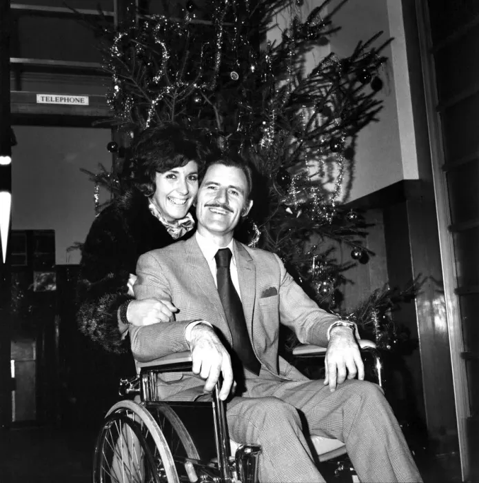 Framed Print : Racing driver Graham Hill left University College Hospital, in a wheelchair Framed Print : Racing driver Graham Hill left University College Hospital, in a wheelchair