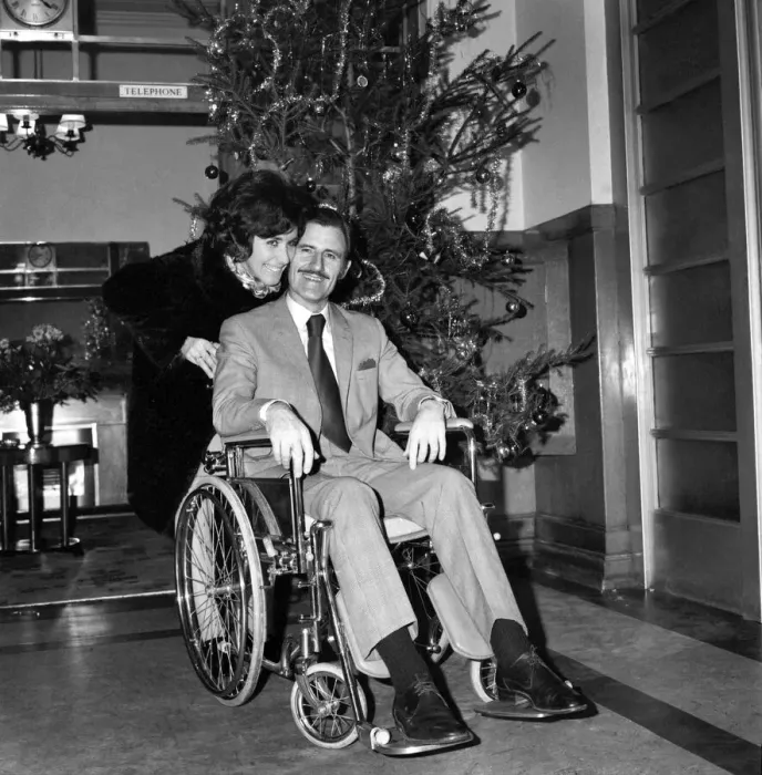 Framed Print : Racing driver Graham Hill left University College Hospital, in a wheelchair Framed Print : Racing driver Graham Hill left University College Hospital, in a wheelchair