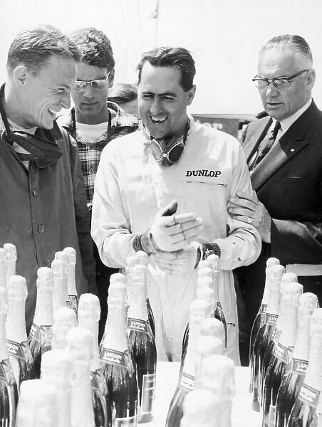 Racing driver Jack Brabham seen here celebrating 9th July 1964 Local Caption