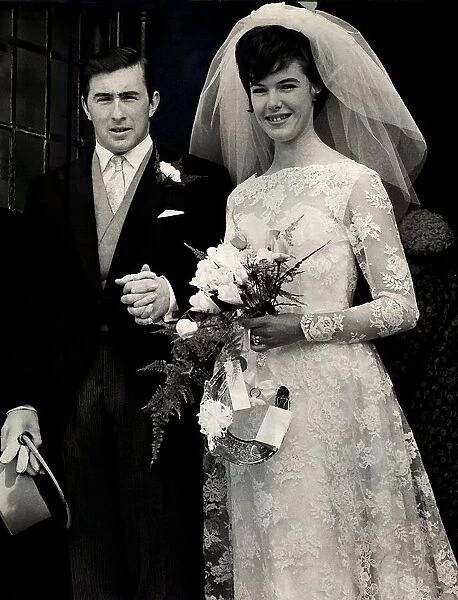 Racing driver Jackie Stewart with his bride Helen McGregor after their wedding ceremony