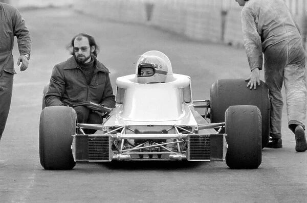 Racing driver John Surtees and his new racing car. January 1976 S76-0088-001