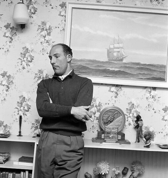 Racing driver Stirling Moss at his home in Mayfair. 13th March 1960