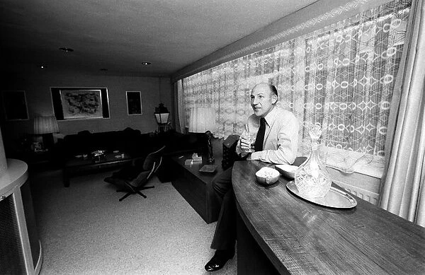 Racing driver Stirling Moss in his new home 1978