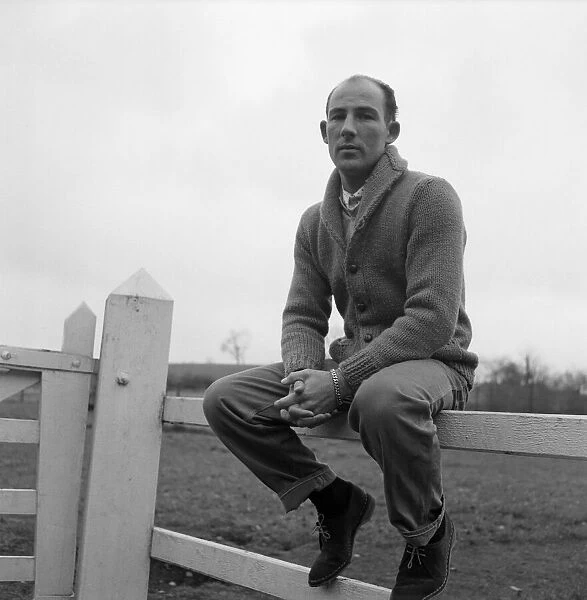 Racing driver Stirling Moss pictured at Nunney, near Frome, Somerset