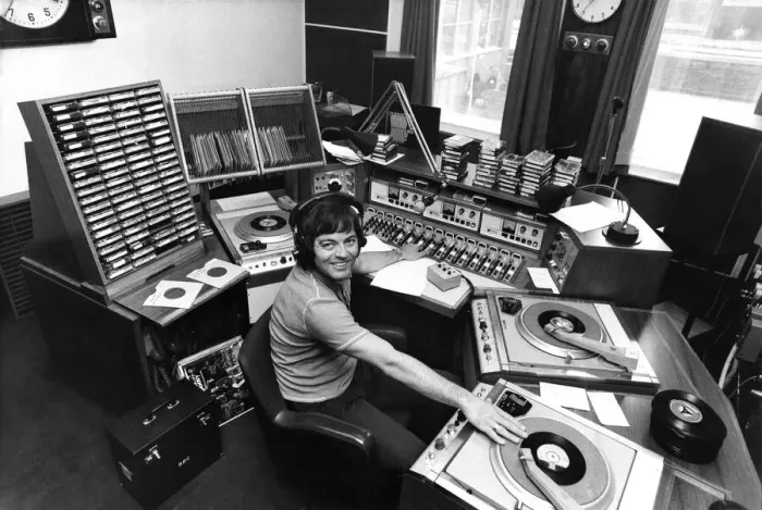 Framed Print : Radio I disc-jockey Tony Blackburn at the studio console equipped with all the tricks of