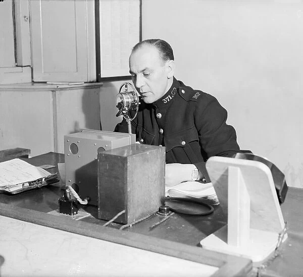 Radio and telegraph officer on duty in Scotland Yards information room