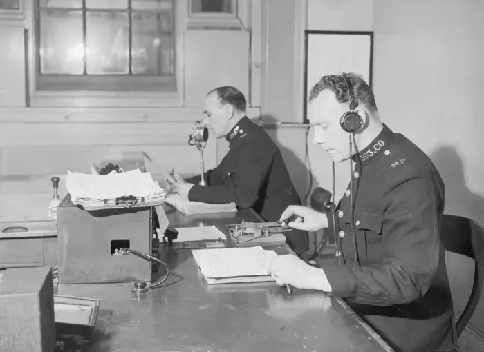 Framed Print : Radio and telegraph officers on duty in Scotland Yards information room Framed Print : Radio and telegraph officers on duty in Scotland Yards information room