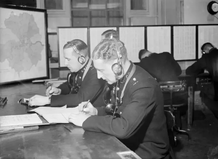 Framed Print : Radio and telegraph officers on duty in Scotland Yards information room Framed Print : Radio and telegraph officers on duty in Scotland Yards information room