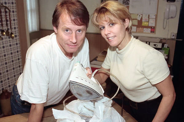 Radio WM presenters Tony Wadsworth and Julie Mayer pictured with an iron
