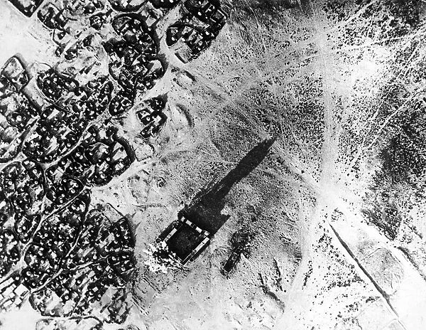 RAF aerial photo of a bomb bursting close to a fort on the Palestine Front Circa June