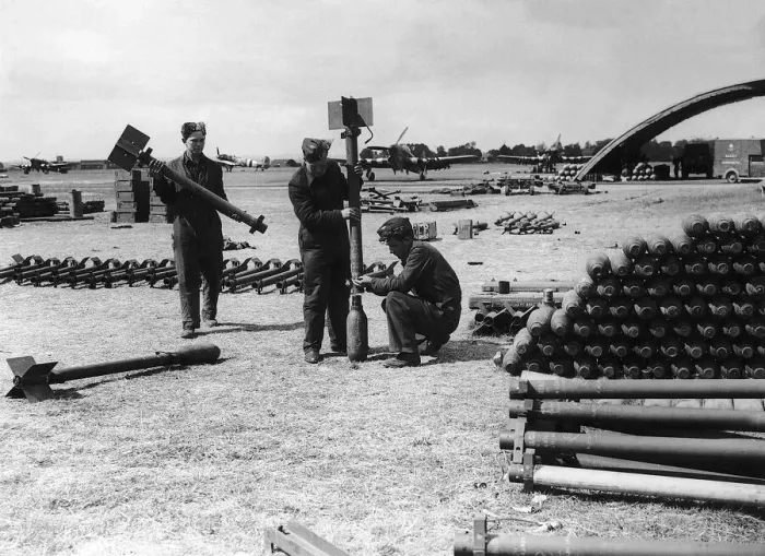 Framed Print : RAF armourers prepare rockets for Hawker Typhoon aircraft during WW2 1944