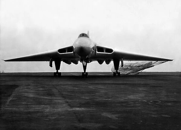A RAF Avro Vulcan V-bomber touches down and brakes using it