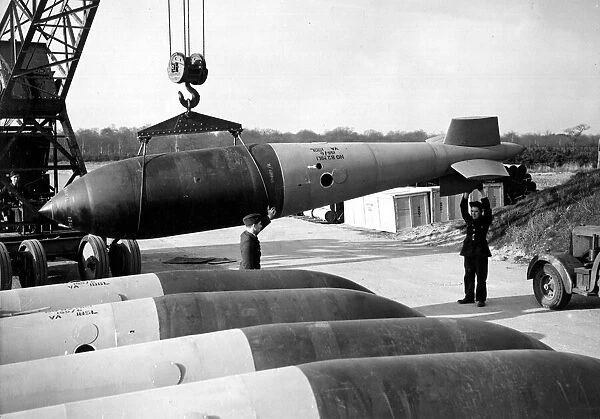 An RAF Grand Slam bomb being hoisted from the bomb dump during World War Two May