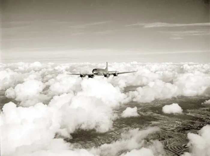 Framed Print : RAF Hastings aircraft flies through cloud cover far above the landscape below. Circa 1950 Framed Print : RAF Hastings aircraft flies through cloud cover far above the landscape below. Circa 1950