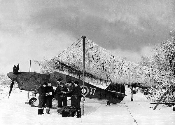 An RAF Hurricane in a snow-covered field in Russia during WW2 1942
