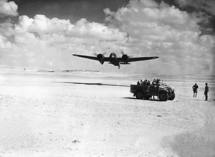 Framed Print : RAF Middle East Command planeover fliesa British desert patrol in Egypt. Circa 1942 Framed Print : RAF Middle East Command planeover fliesa British desert patrol in Egypt. Circa 1942