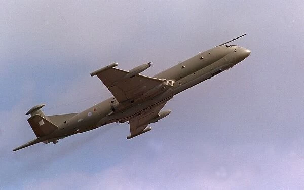 An RAF Nimrod aircraft in flight at the Wroughton Air show. August 1993